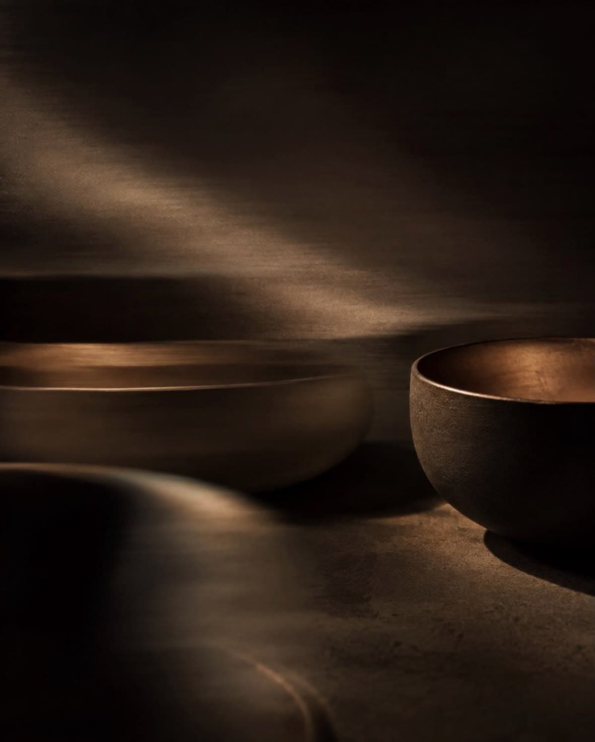 Bronze singing bowls set out in the ritual room